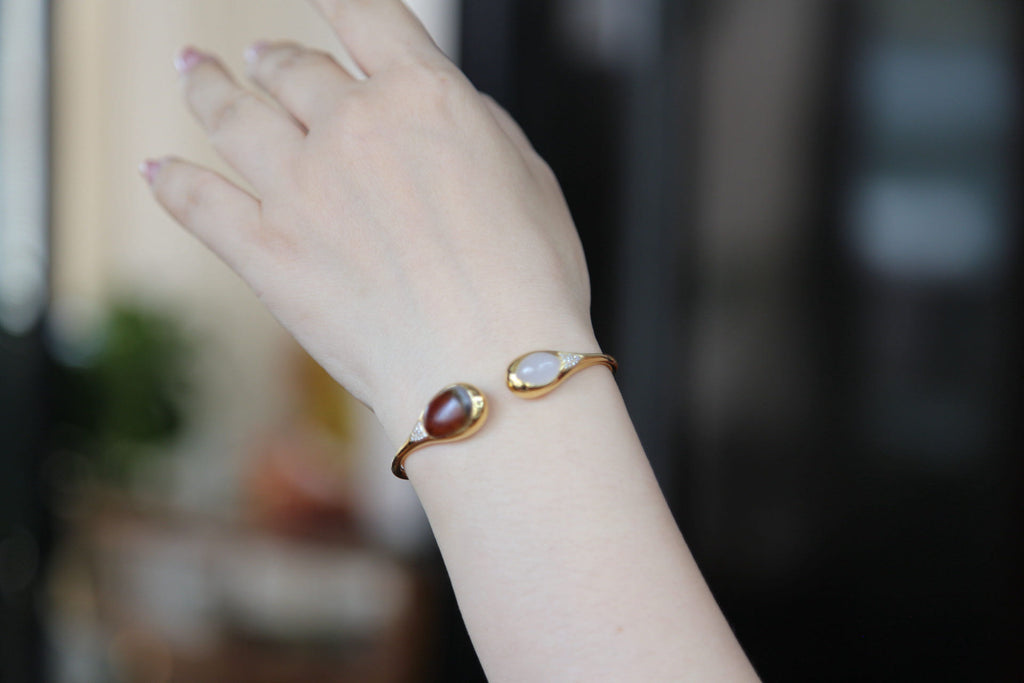 ATELIER 004 · Caramel — nephrite jade bangle, on the model