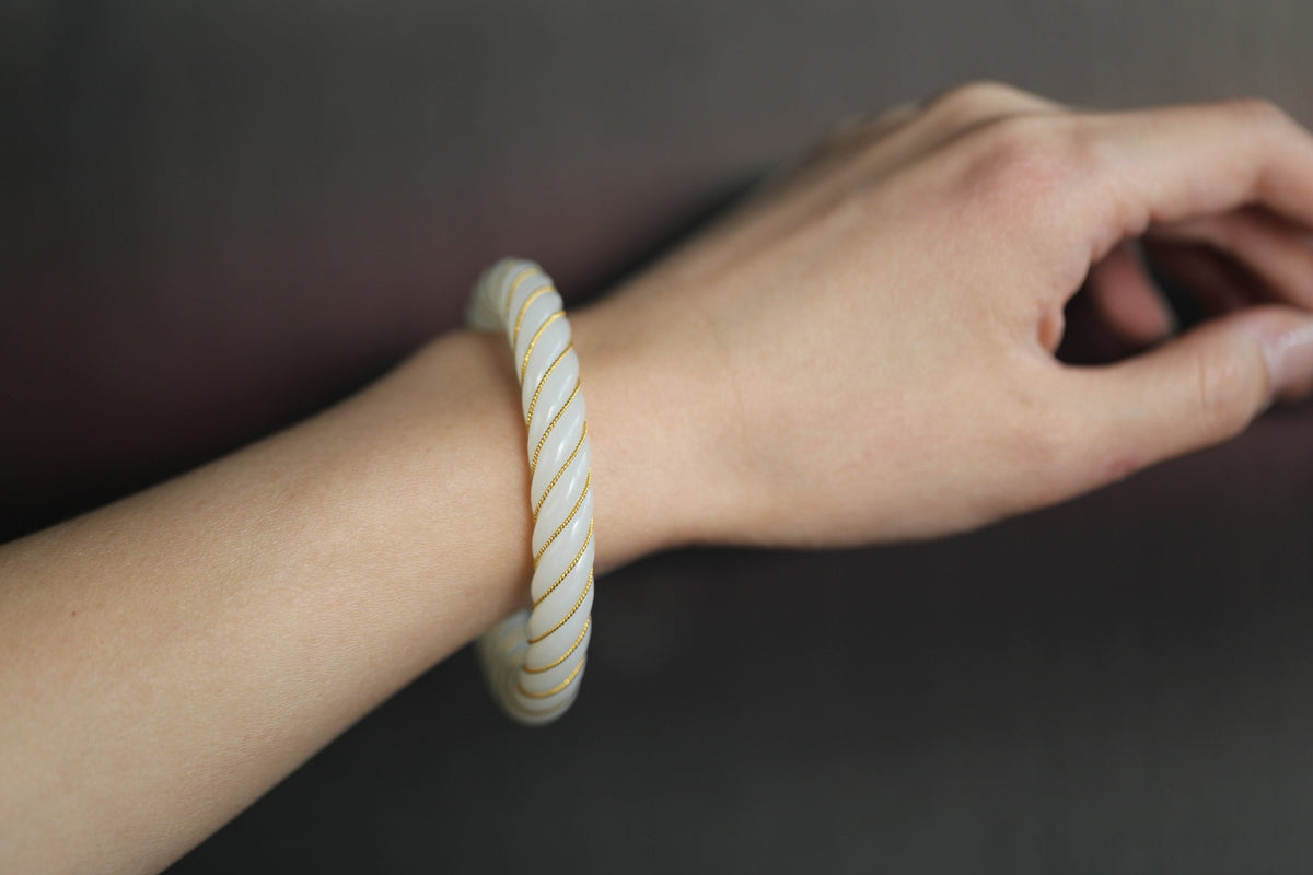 ATELIER 005 · Suet White — nephrite jade bangle, on the model