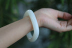 ATELIER 006 · Suet White — nephrite jade bangle, on the wrist