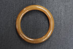 ATELIER 007 · Caramel — nephrite jade bangle, front