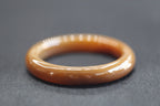ATELIER 007 · Caramel — nephrite jade bangle, detail
