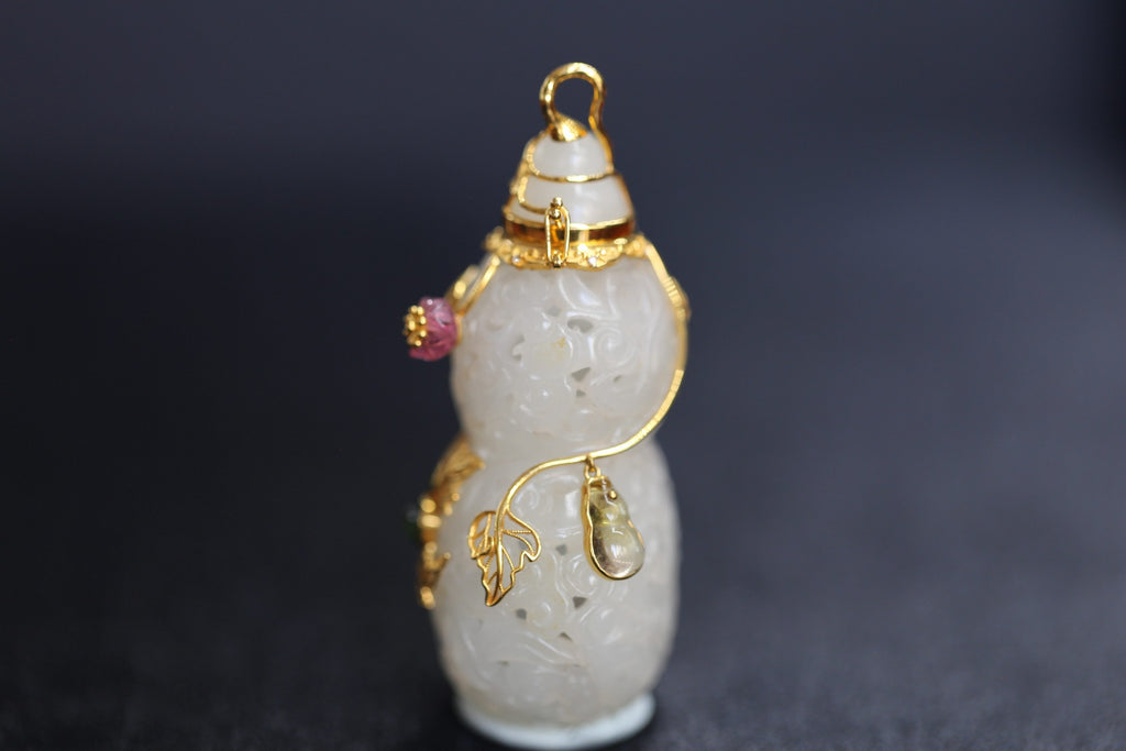 ATELIER 011 · Suet White — nephrite jade carving, side view