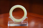 ATELIER 012 · Golden Green — nephrite jade round bangle, front