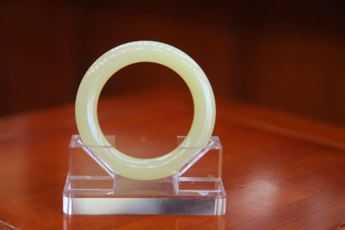 ATELIER 012 · Golden Green — nephrite jade round bangle, front