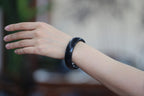 ATELIER 014 · Ink Wash — nephrite jade flat bangle, on the wrist