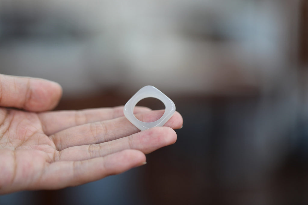 ATELIER 016 · Suet White — nephrite jade ring, on the hand, alternate view