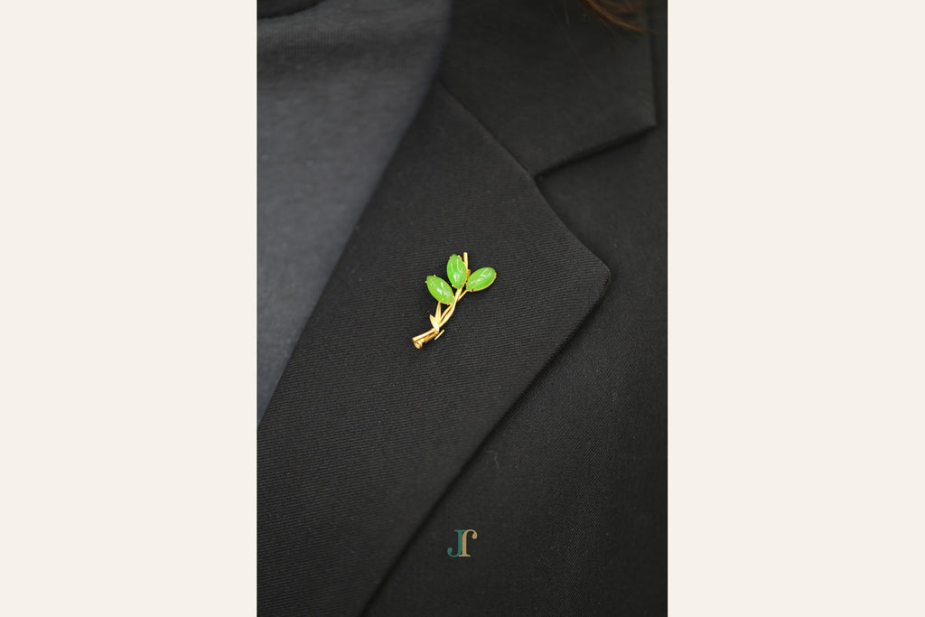 ATELIER 022 · Willow Green — nephrite jade brooch, on a lapel