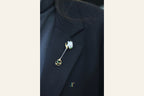 ATELIER 023 · Suet White — nephrite jade brooch, on a lapel
