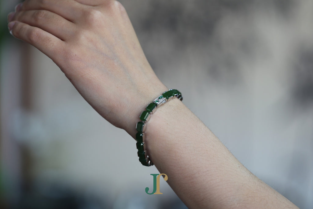 ATELIER 025 · Spinach Green — nephrite jade bracelet, on the wrist