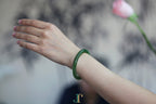 ATELIER 026 · Willow Green — nephrite jade round bangle, on the model