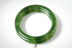 ATELIER 027 · Spinach Green — nephrite jade round bangle, side view