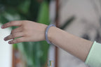ATELIER 030 · Smoky Lilac — nephrite jade round bangle, on the wrist