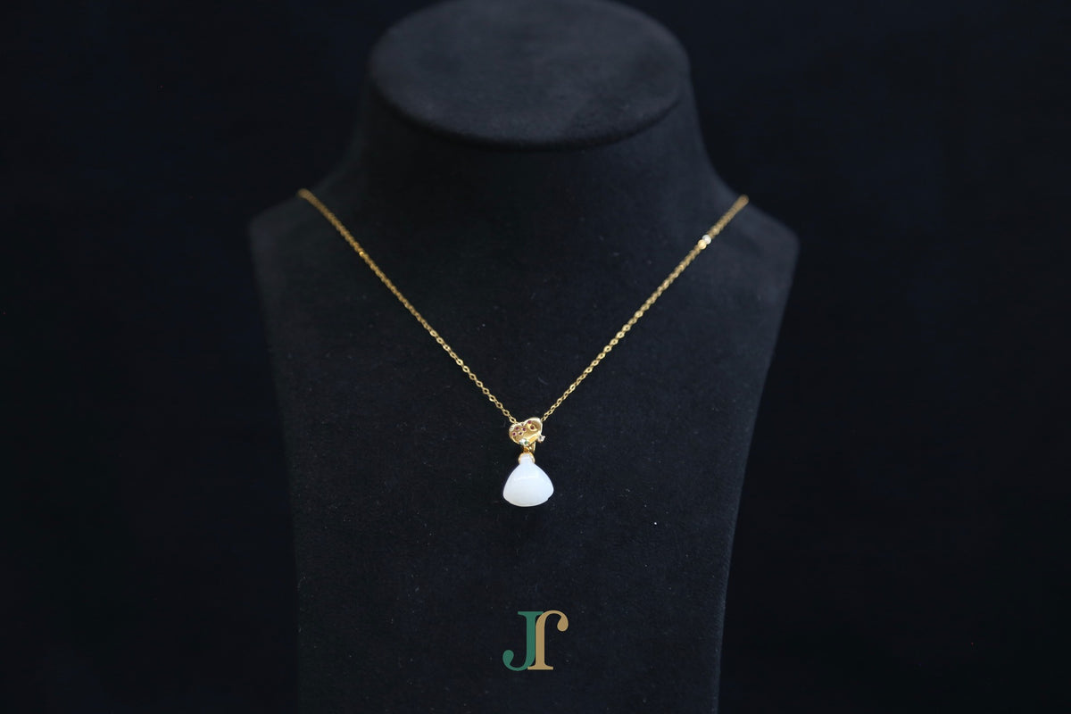 ATELIER 033 · Suet White — nephrite jade pendant, front