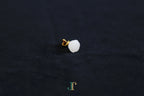 ATELIER 033 · Suet White — nephrite jade pendant, side view