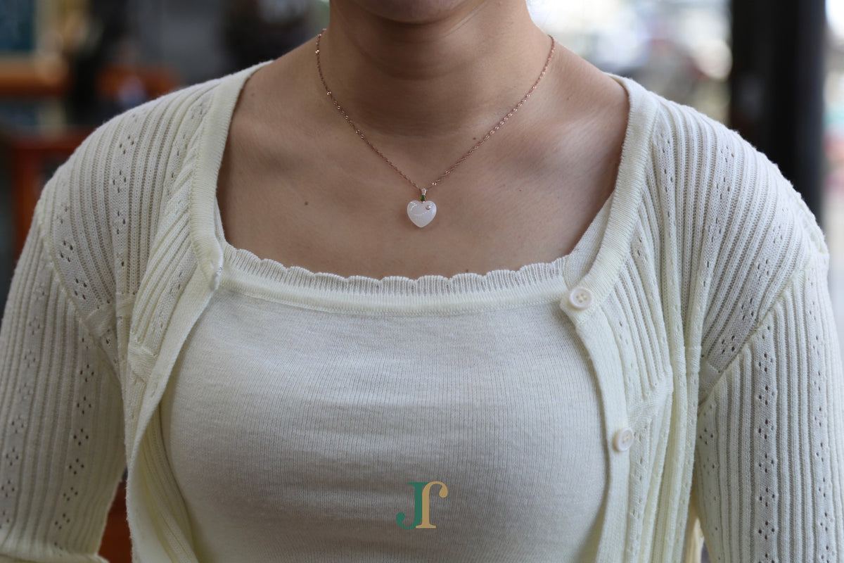 ATELIER 034 · Suet White — nephrite jade pendant, worn