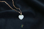 ATELIER 034 · Suet White — nephrite jade pendant, close view