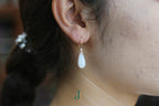 ATELIER 035 · Suet White — nephrite jade earrings, on the ear