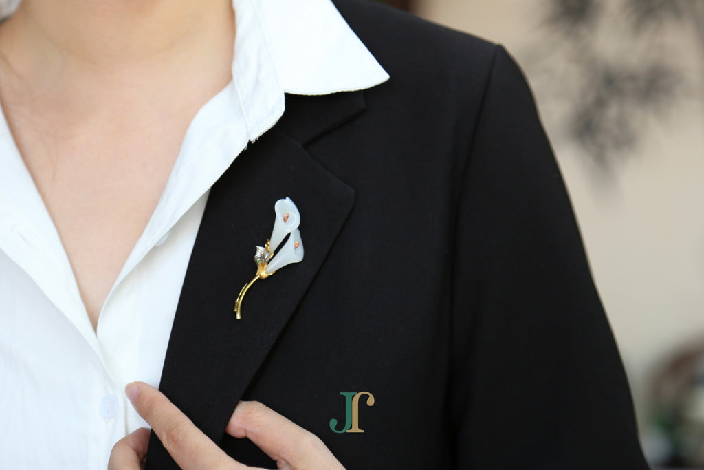 ATELIER 036 · Suet White — nephrite jade brooch, on a lapel