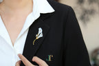 ATELIER 036 · Suet White — nephrite jade brooch, on a lapel