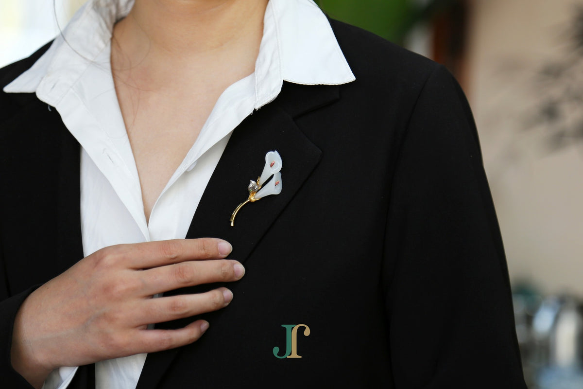 ATELIER 036 · Suet White — nephrite jade brooch, on a lapel, second view
