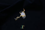 ATELIER 038 · Suet White — nephrite jade brooch, angled view