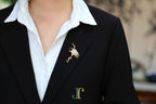 ATELIER 038 · Suet White — nephrite jade brooch, on a lapel