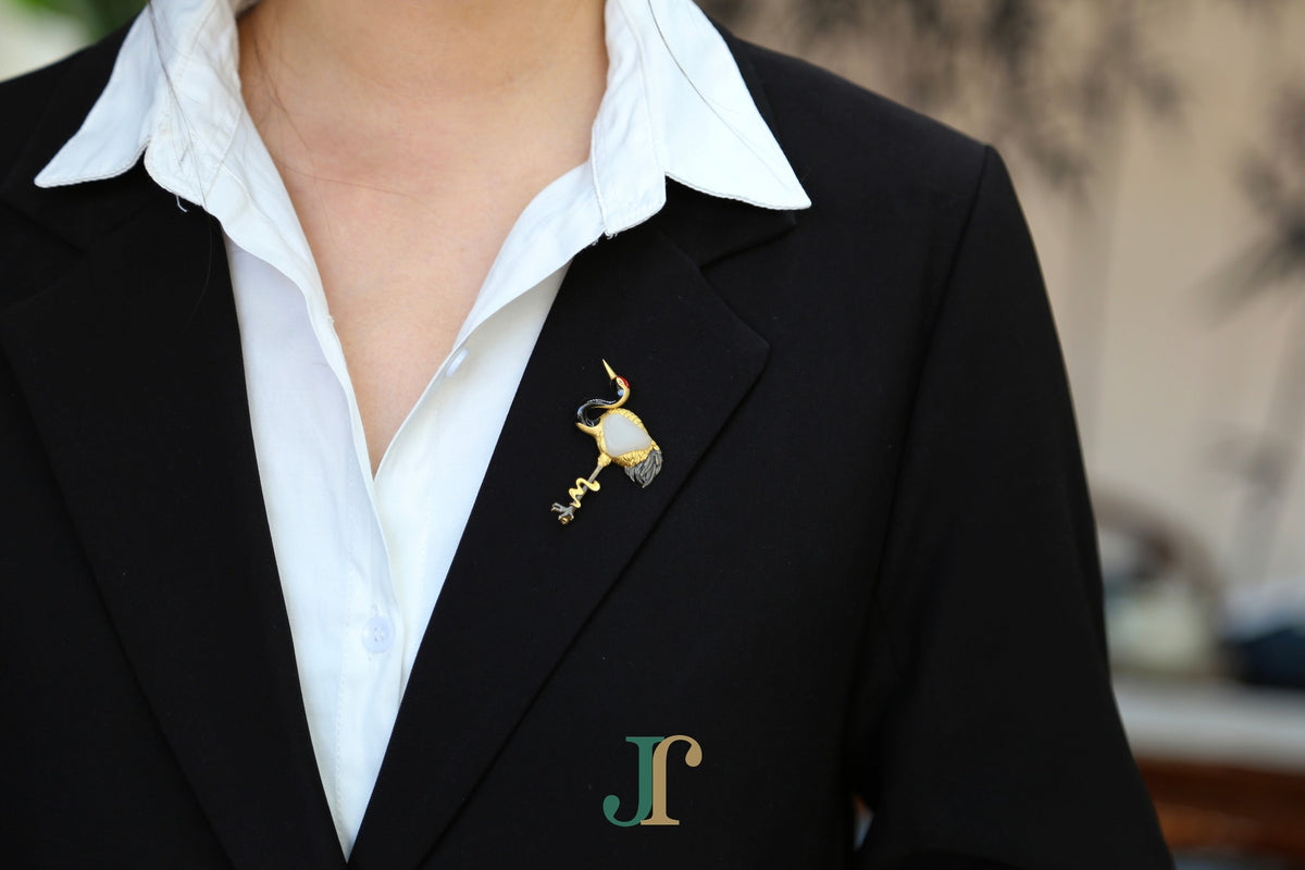 ATELIER 038 · Suet White — nephrite jade brooch, on a lapel