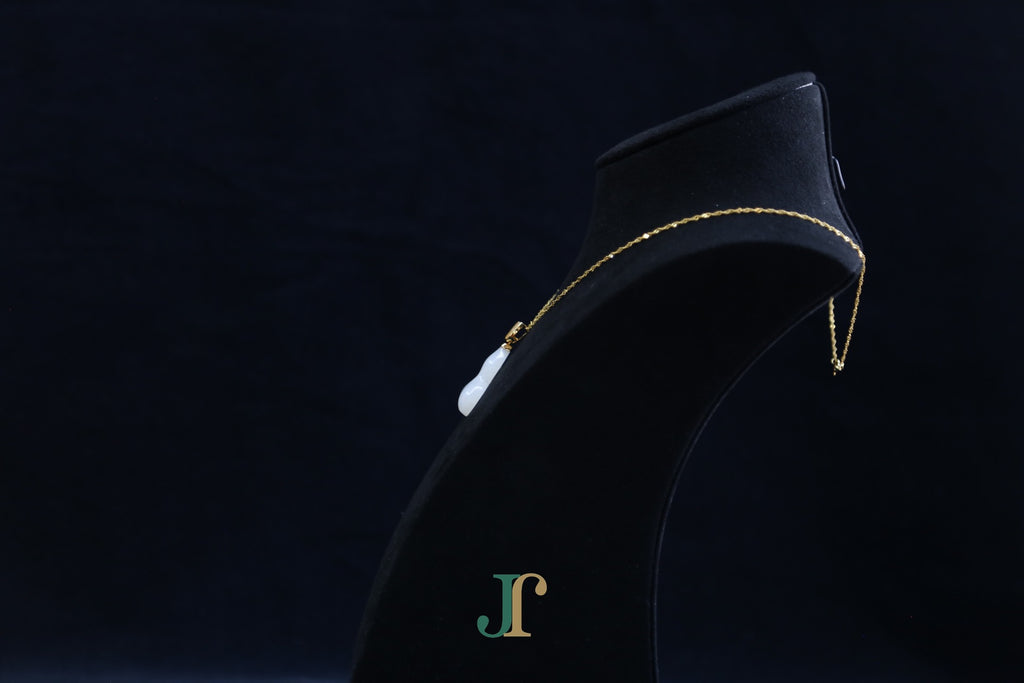 ATELIER 041 · Suet White — nephrite jade pendant, side view