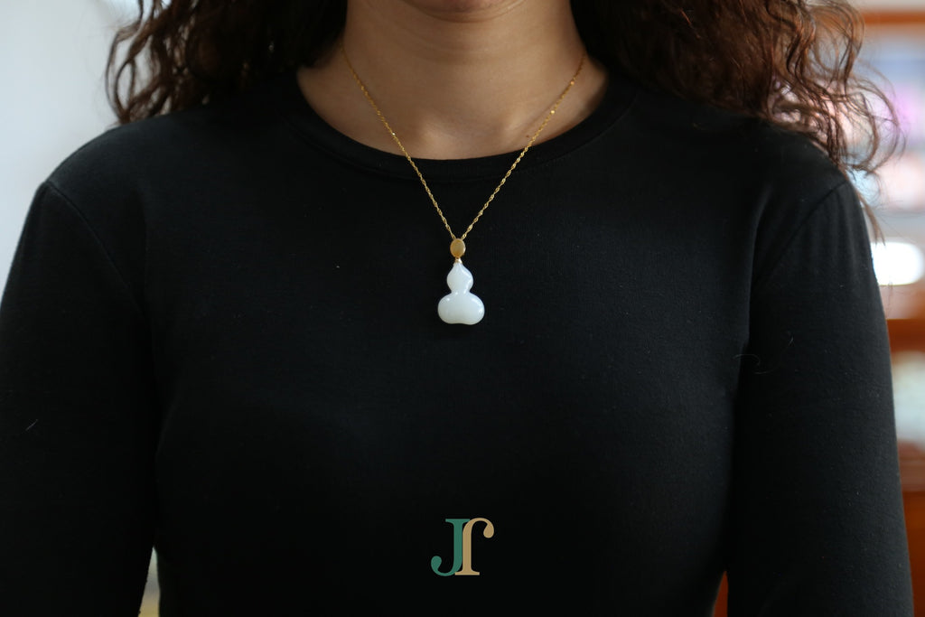 ATELIER 041 · Suet White — nephrite jade pendant, worn