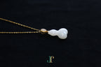 ATELIER 041 · Suet White — nephrite jade pendant, close view
