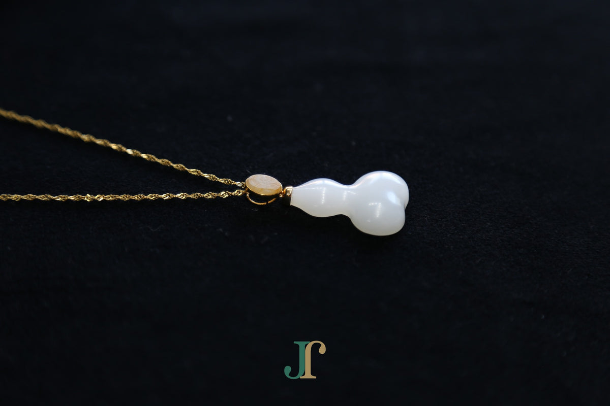 ATELIER 041 · Suet White — nephrite jade pendant, close view