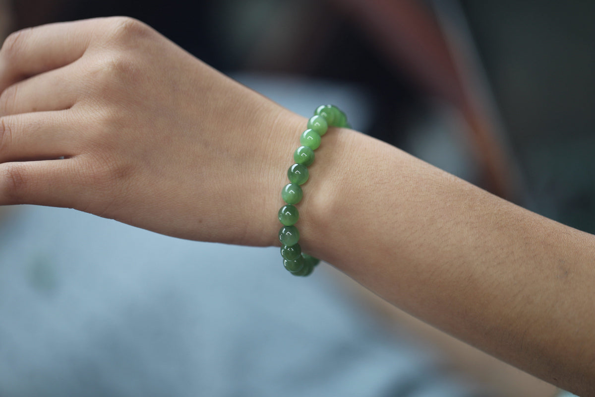 GAIA Earthy — natural nephrite jade bead bracelet, on the wrist