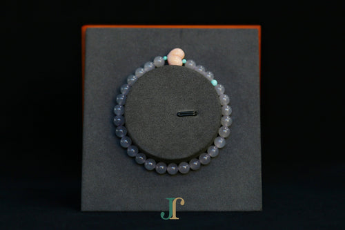 GAIA Earthy 6 Spiritual · Smoky Lilac · Heart — nephrite jade bead bracelet, on a display stand