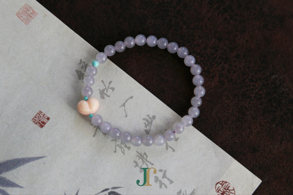 GAIA Earthy 6 Spiritual · Smoky Lilac · Heart — nephrite jade bead bracelet, close view