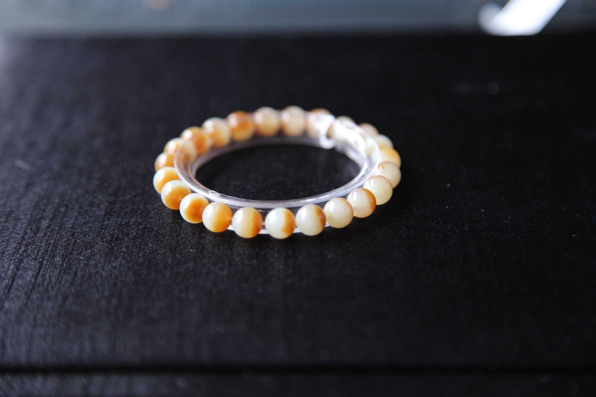 GAIA Earthy Honey Amber — natural nephrite jade bead bracelet, detail