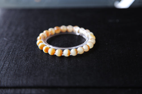 GAIA Earthy Honey Amber — natural nephrite jade bead bracelet, detail