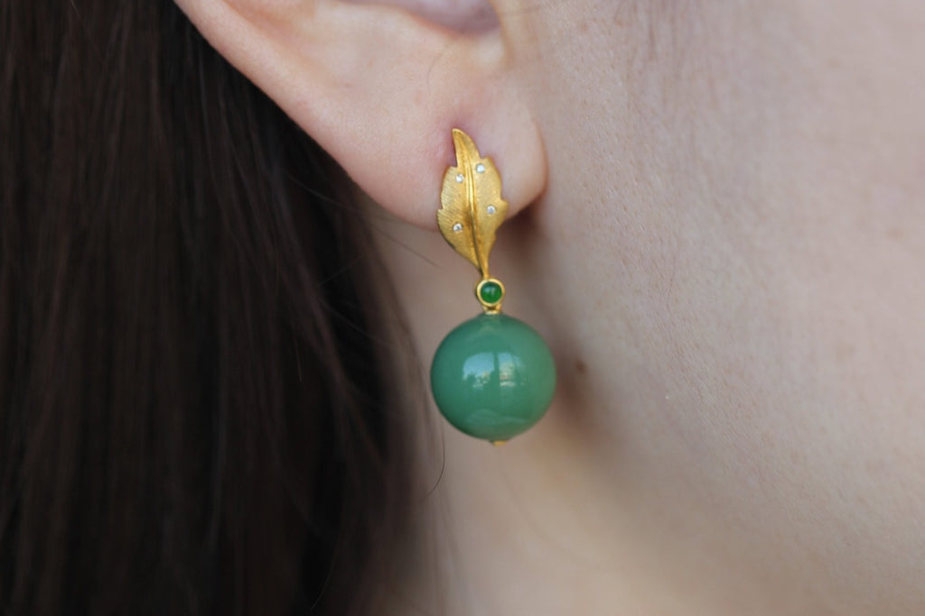 GAIA Leaf 12 · Willow Green — nephrite jade earrings, on the model