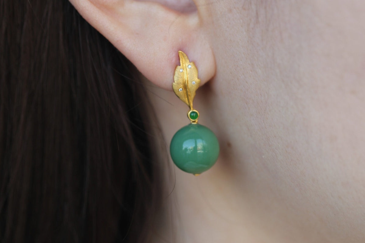 GAIA Leaf 12 · Willow Green — nephrite jade earrings, on the model