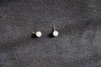 GAIA Luna 8 · Suet White — nephrite jade earrings, on the model