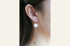 GAIA Luna 14 · Suet White — nephrite jade earrings, on the ear