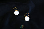 GAIA Luna 14 · Suet White — nephrite jade earrings, flat lay
