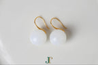 GAIA Luna 14 · Suet White — nephrite jade earrings, close view