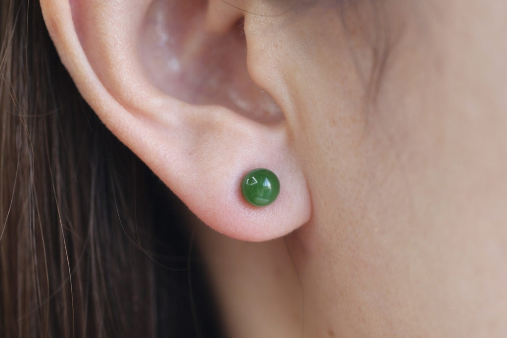 GAIA Luna 6 · Spinach Green — nephrite jade earrings, on the model