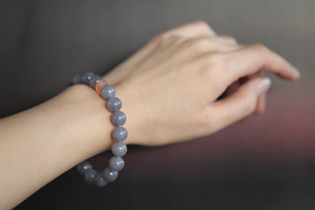 GAIA Earthy 10 · Smoky Lilac — nephrite jade bead bracelet, on the model