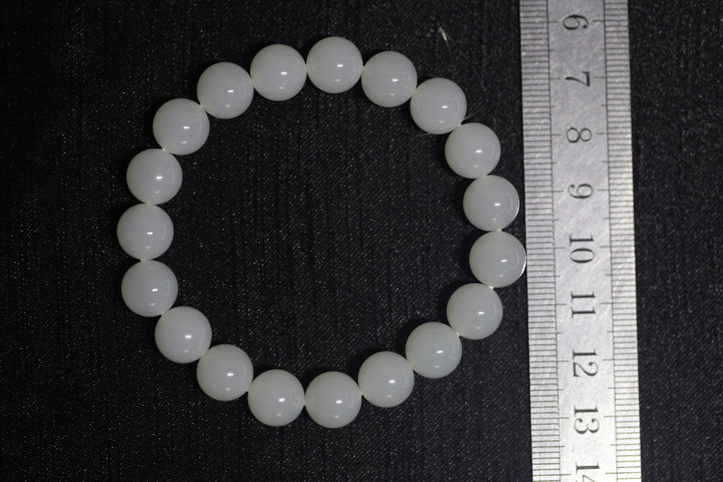 GAIA Earthy 10 · Suet White — nephrite jade bead bracelet, size reference