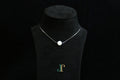 GAIA Pure 10 · Suet White — nephrite jade bead necklace, on a display bust