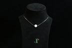 GAIA Pure 10 · Suet White — nephrite jade bead necklace, on a display bust