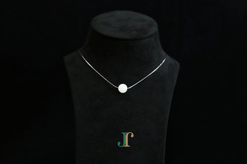 GAIA Pure 10 · Suet White — nephrite jade bead necklace, on a display bust