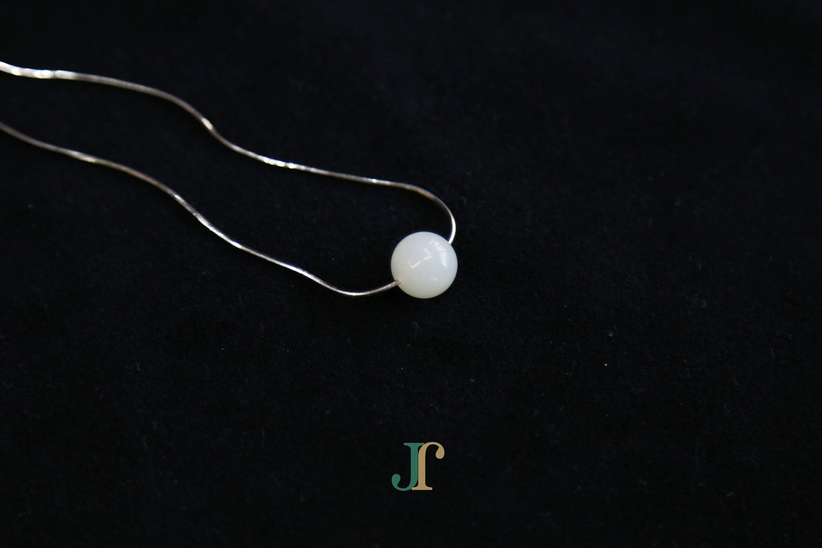 GAIA Pure 10 · Suet White — nephrite jade bead necklace, detail
