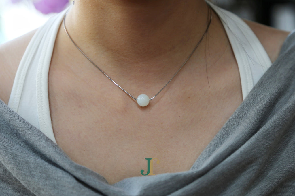 GAIA Pure 10 · Suet White — nephrite jade bead necklace, worn